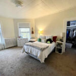 1429 East 2nd Street - Duluth rental property - bedroom with fireplace