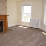 1429 East 2nd Street - Duluth rental property - bedroom with fireplace